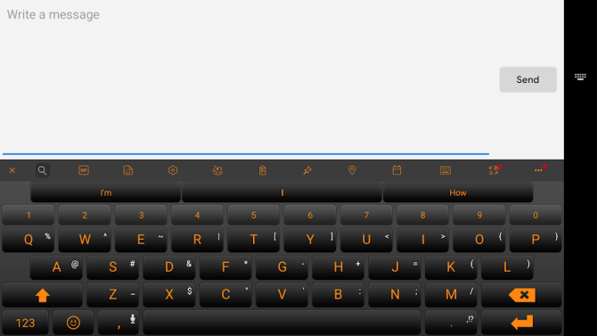 Detta är en skärmdump av SwiftKey's virtuella tangentbord med Pumpkin-tema aktiverat